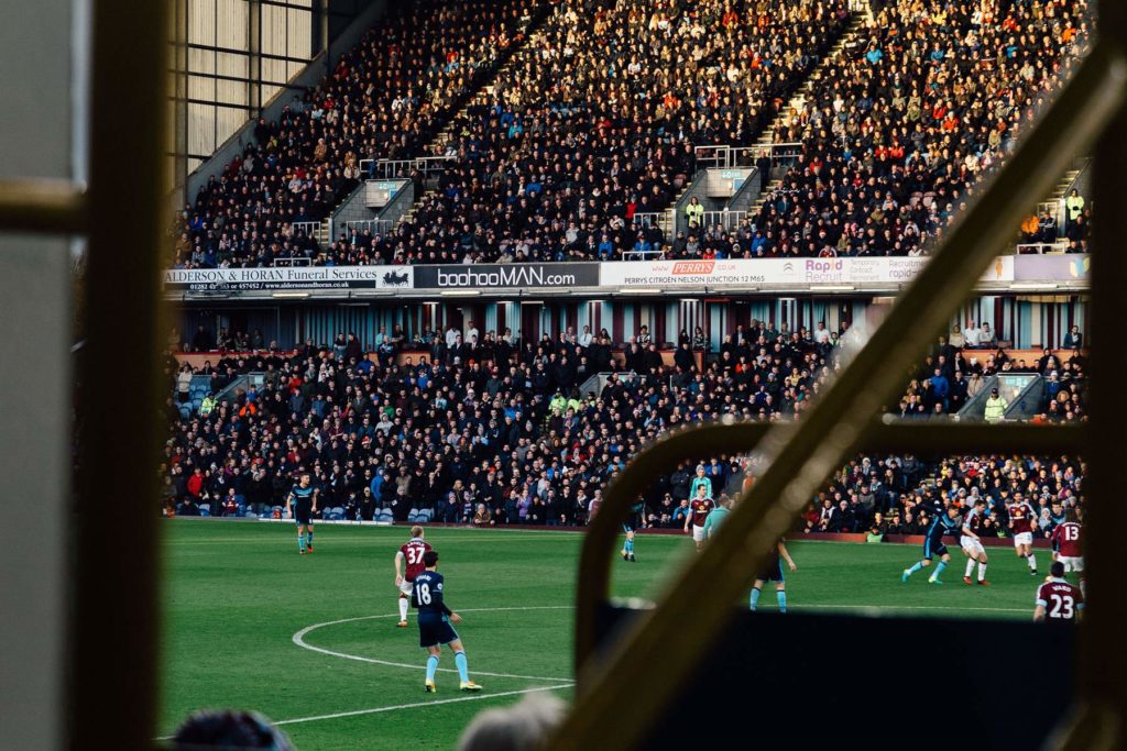 Football crowd at Burnley. Photo by Nathan Rogers on Unsplash