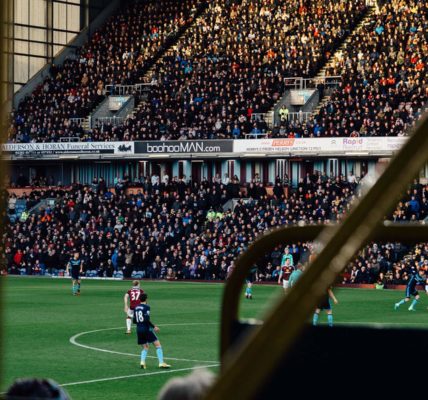 Football crowd at Burnley. Photo by Nathan Rogers on Unsplash