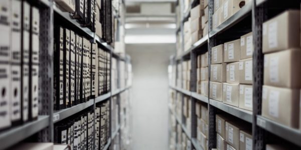Archive shelves. Photo by Samuel Zeller on Unsplash
